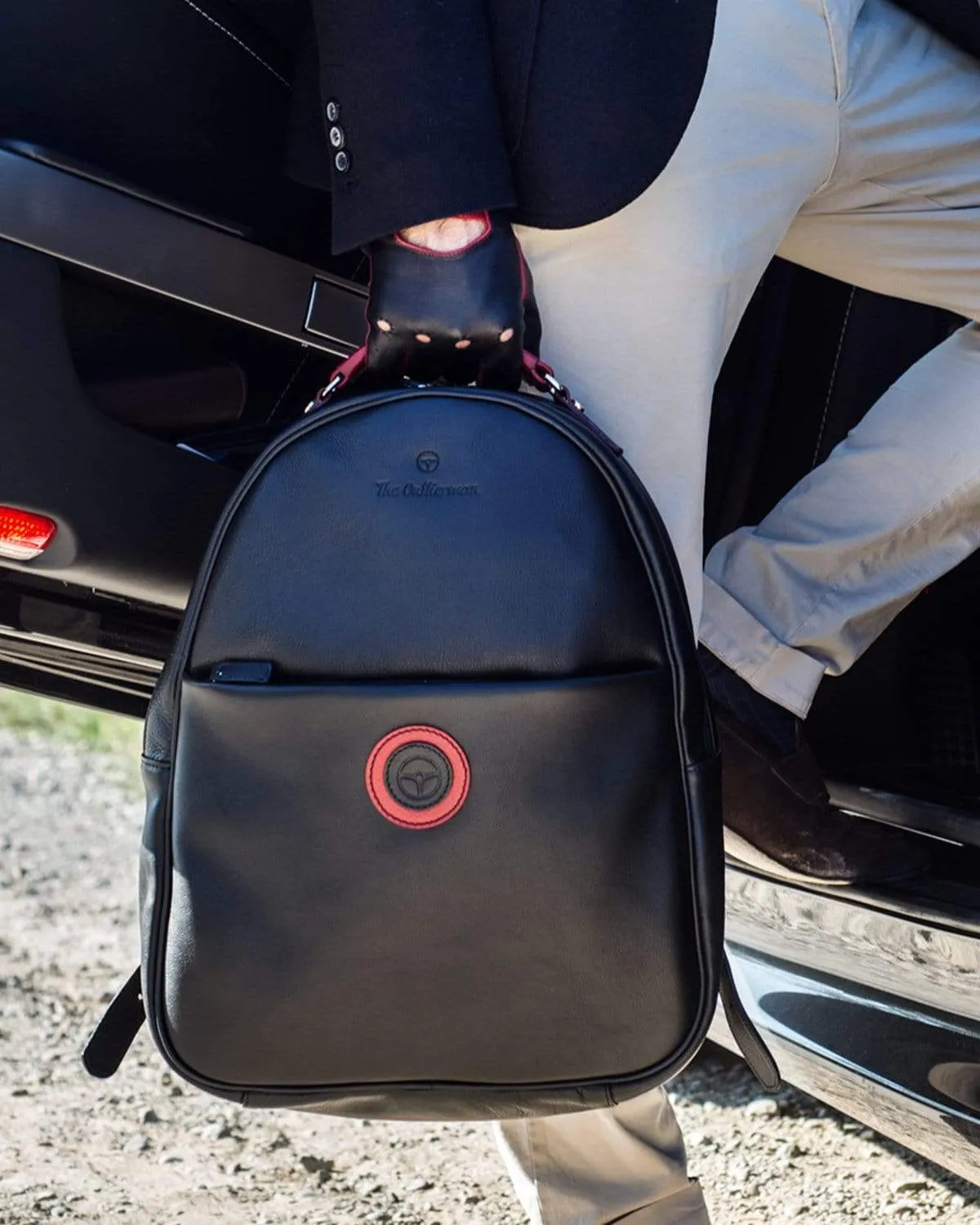 GLOBETROTTER - Full-grain Leather Backpack - Black/Red